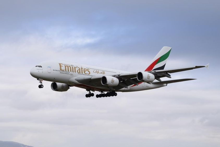 Emirates airplane in the air.