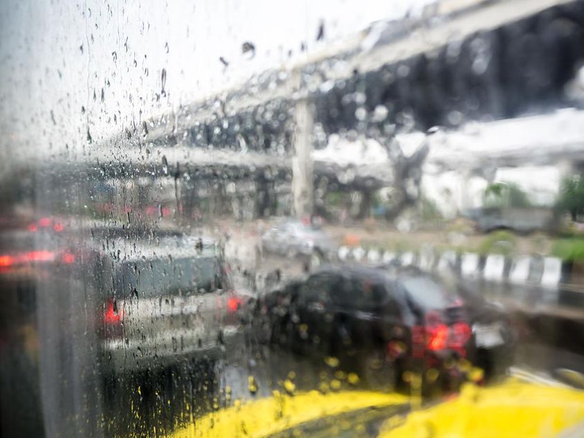 Dubai rain through glass.