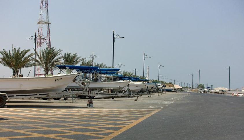 Kalba Sharjah, UAE view of fishing boats lined along the coast.