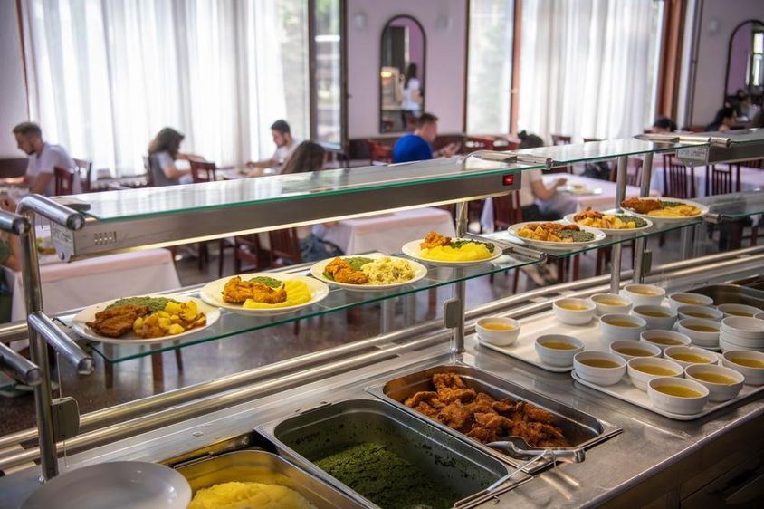 Students being served lunch during school break.