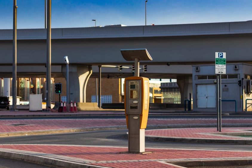 Dubai parking terminal (solar-powered) in a paid parking area.