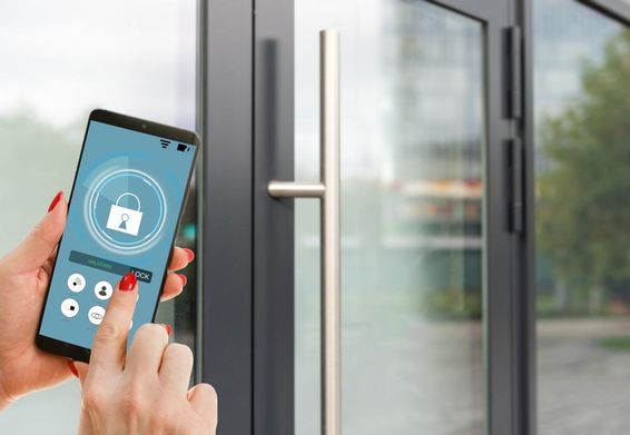 Smartphone displaying smart home application on screen.