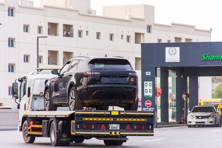 Range Rover on a tow truck in Sharjah city.