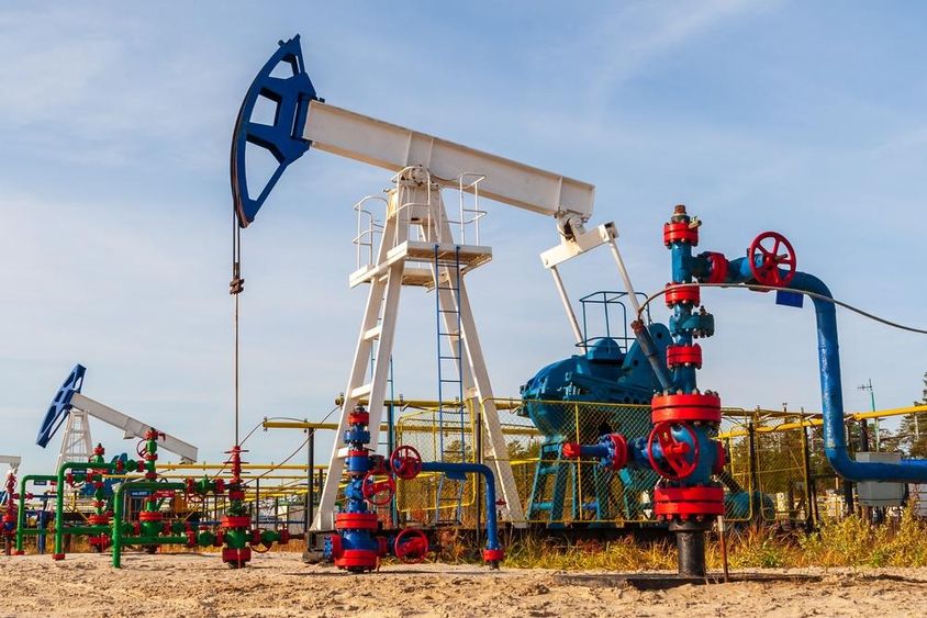 Oil pump in Siberian fields, oil and gas industry in Russia.