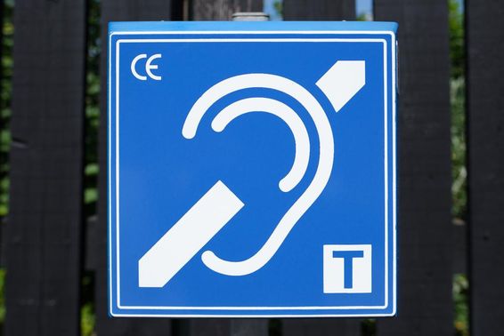 An audio induction loop assisting hearing aid users.