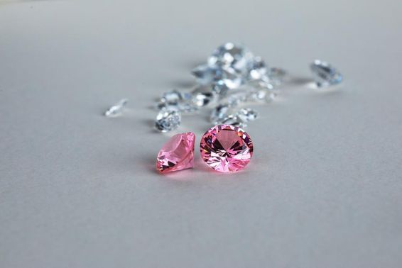 Colorful lab-grown round-cut diamond.