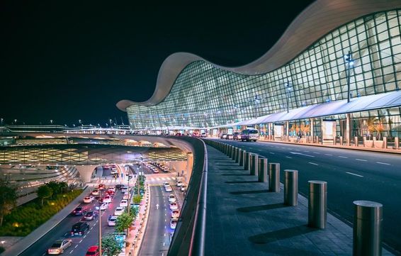 Panoramic view of the new Zayed International Airport at night in Abu Dhabi.