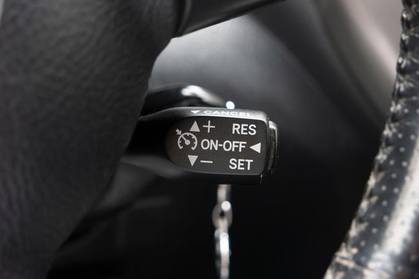 Cruise control lever in a car.
