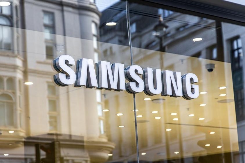 Samsung tech brand logo on glass window.