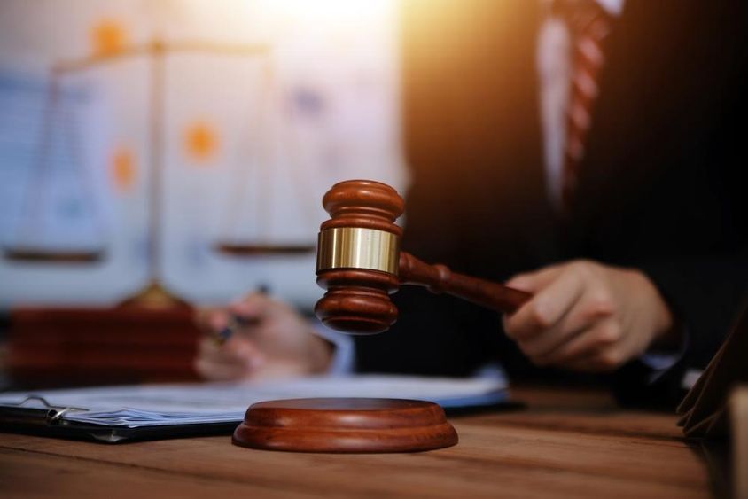 Judge's gavel in a courtroom.