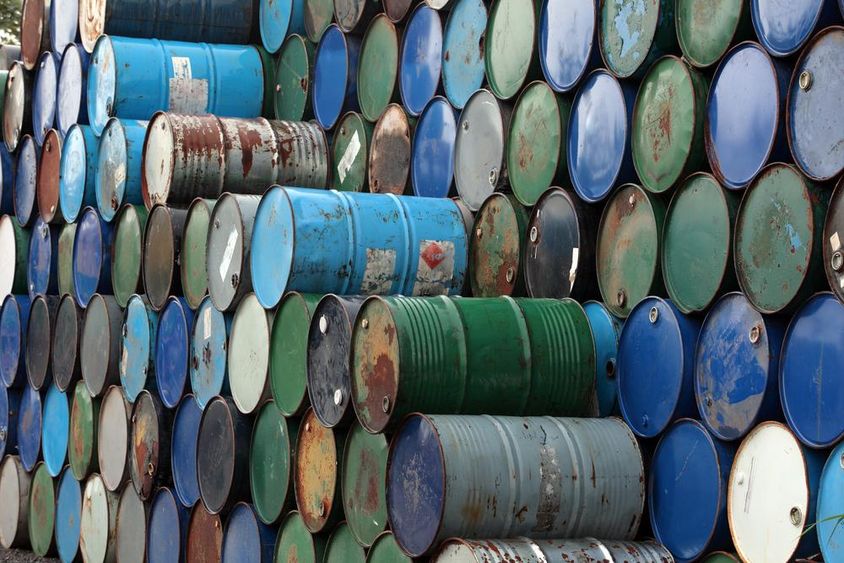 Oil barrels stacked on top of each other.
