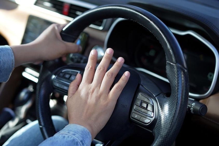 The sudden noise of a car horn